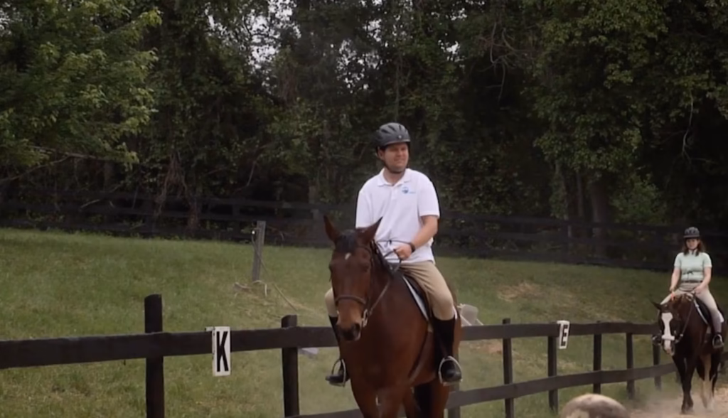 Life in Strides documentary - Jake riding his horse in the arena